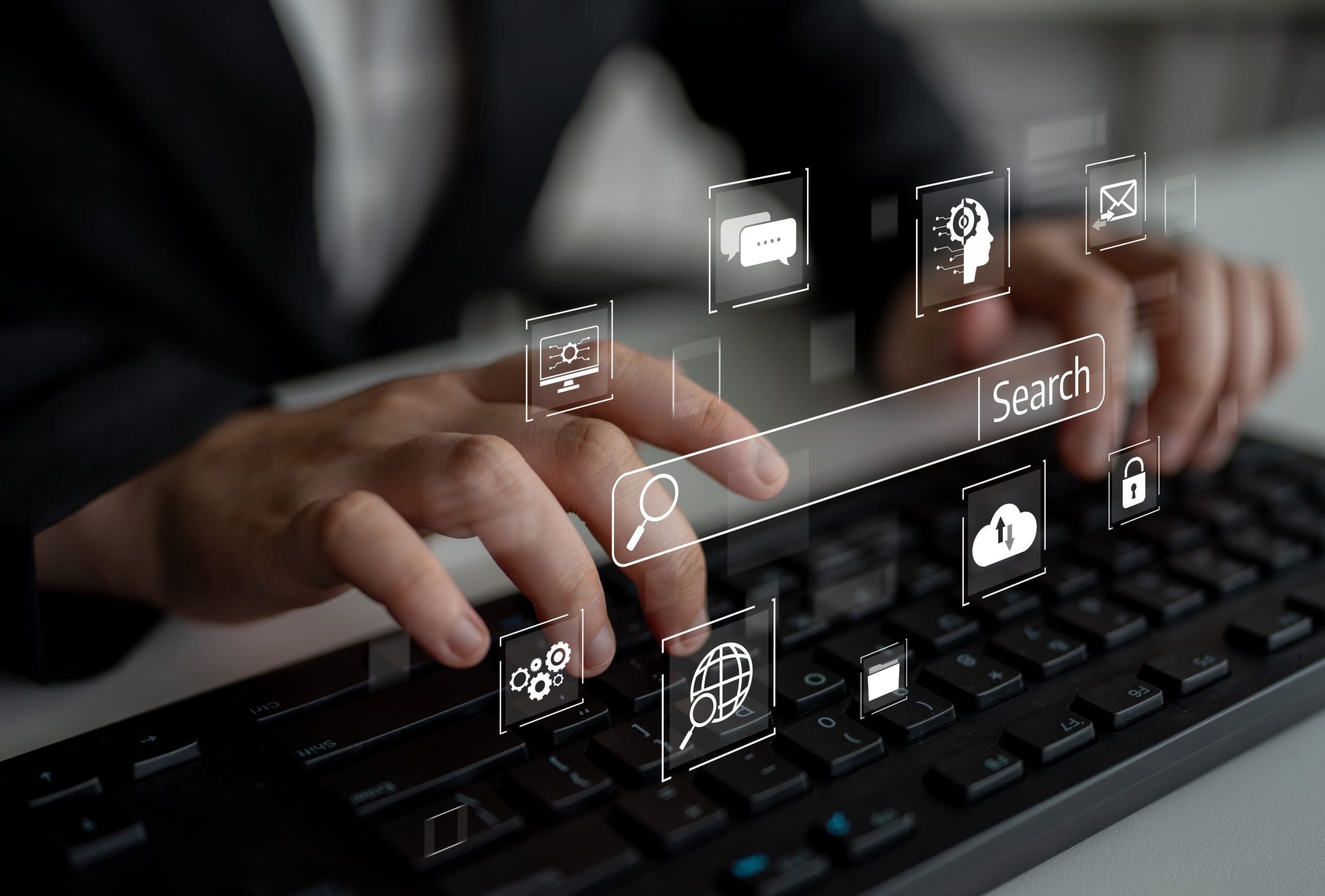 Person typing on a keyboard with translucent floating icons and a search field above the keys.