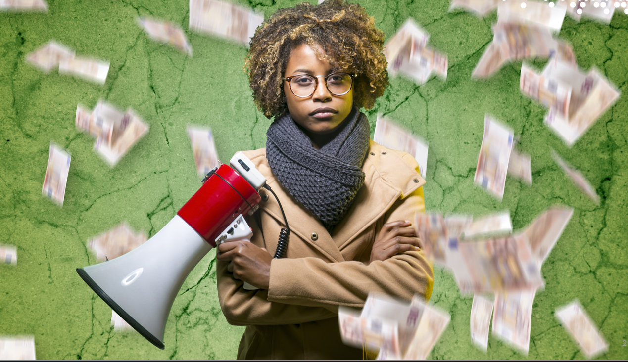 Woman in a tan coat holding a red megaphone while money rains around her against a cracked green wall.